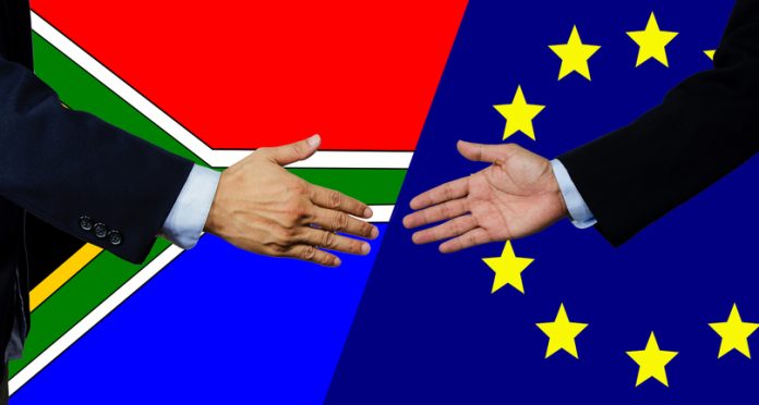 A business man shake each other hand,South Africa and EU Europe-Africa Relations