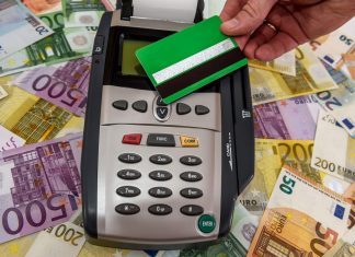 The Quiet Infrastructure Behind Europe’s Cash-to-Card Shift Europe’s Cash-to-Card Shift - credit card and euro banknotes