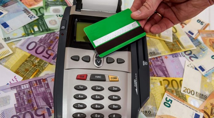 The Quiet Infrastructure Behind Europe’s Cash-to-Card Shift Europe’s Cash-to-Card Shift - credit card and euro banknotes