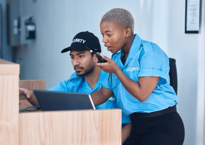 Security guards, communication and police team use a walkie talkie or radio for an emergency or criminal investigation.