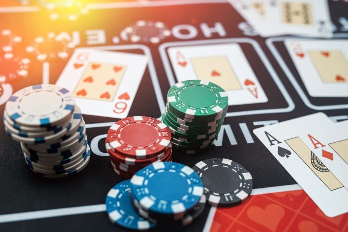 Gambling.com Verifies Casino Game - combination cards and stack of chips