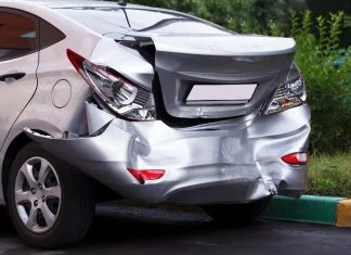 How to Handle Insurance After a Car Is Damaged in a Parking Lot Car Insurance After Parking Lot Damage - Big dent on car