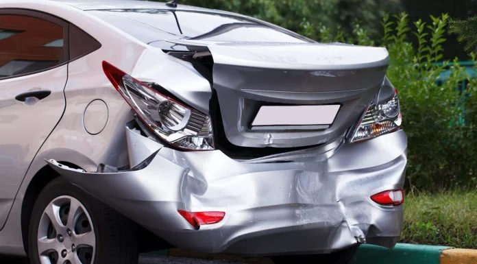 How to Handle Insurance After a Car Is Damaged in a Parking Lot Car Insurance After Parking Lot Damage - Big dent on car
