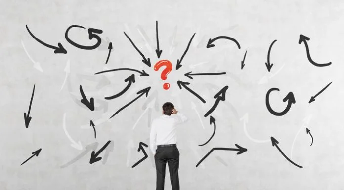 Decision Fatigue: Why Everything Feels Urgent, But Nothing Feels Finished businessman is thinking how to solve the problem. Decision Fatigue concept