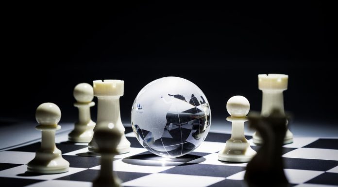 The Global Chessboard for Europe’s Frontier Companies Geographic Strategy - Glass globe on chess board