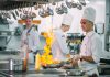 How Professional Kitchen Clothing Can Support Staff Performance and Workplace Safety Chef wearing Kitchen Clothing for Safety