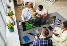 What Happens When CX Buys the Tool and IT Inherits It CX Buys the Tool - Team of programmers