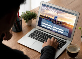 Businessman booking a flight online