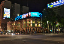 How Brands Can Adapt Creative Across Sydney and Melbourne Brands poster in the street of Melbourne