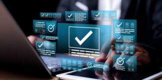 Businessman validating digital documents using futuristic interface with checkmark icons, quality assurance system, Website, compliance review, and document verification.