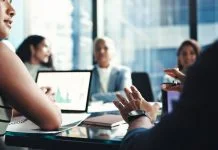 How to Capture Meeting Decisions Without Writing Everything Down Capture Meeting Decisions - business people in office boardroom