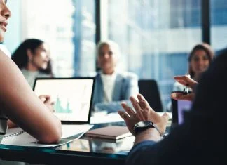 Capture Meeting Decisions - business people in office boardroom
