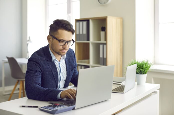 Private Equity Accountancy Firms - businessman working on laptop