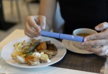 The Cost of Stopping: Why GLP-1 Discontinuation Is an Economic Story, Not a Willpower One GLP-1 Discontinuation and Medication Costs - Ozempic injection pen