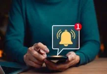  How Real-Time Alerts on Demat Apps are Changing the Way Indians React to Market Moves Mobile notification alert concept.