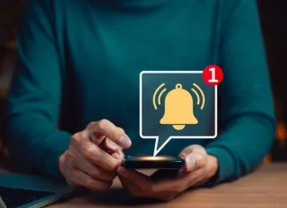  How Real-Time Alerts on Demat Apps are Changing the Way Indians React to Market Moves Mobile notification alert concept.