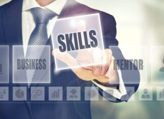 Cognitive Skills and Mental Resilience Training fre Essential For Todayās Leaders Businessman pressing an Skills concept button.
